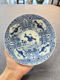 Nine Chinese blue and white plates with figural design, 18th C.