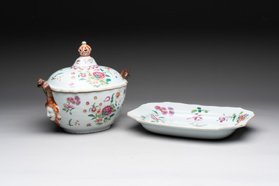 A Chinese famille rose 'mascarons' tureen and cover on stand with floral design, Qianlong