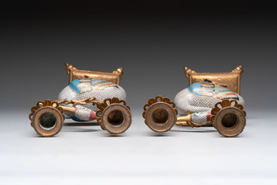 A pair of Chinese cloisonn&eacute; cranes, later mounted as candelabras, 19th C.