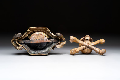 An Italian 'vanitas' or 'memento mori' skull with wooden crossbones on gilt-bronze base, 18/19th C.