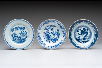 18 Chinese blue and white plates and saucers with floral design, 18th C.
