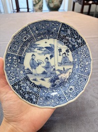 Nine Chinese blue and white plates with figural design, 18th C.