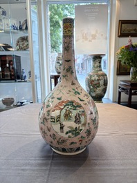 A Chinese famille verte bottle vase, 19th C.