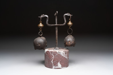 An Italian 'vanitas' or 'memento mori' composition with skulls and forged iron mount, 18/19th C.