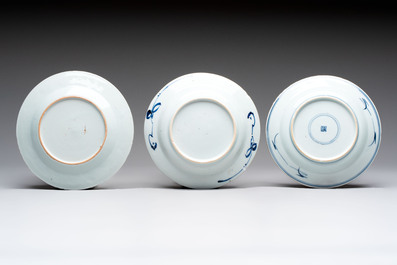 18 Chinese blue and white plates and saucers with floral design, 18th C.