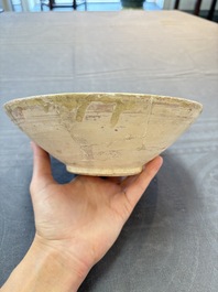 A Samanid pottery 'Kufic' inscribed bowl and a white-spotted brown-ground bowl, Iran, 10th C.