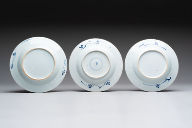 12 Chinese blue and white plates with figural and floral design, 18th C.