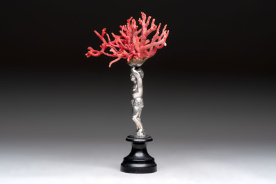 A red coral mounted silver figure, possibly Germany, 19th C.
