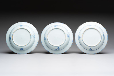 18 Chinese blue and white plates and saucers with floral design, 18th C.