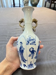 A pair of Chinese blue and white 'Long Eliza and playing boys' vases, Kangxi