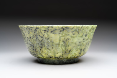 A large Chinese mottled-green serpentine bowl, 20th C.