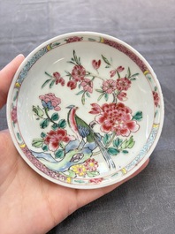 A set of six Chinese famille rose 'peacock' cups and saucers, Yongzheng