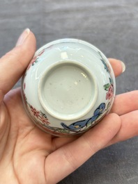 A set of six Chinese famille rose 'peacock' cups and saucers, Yongzheng