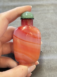 A collection of nine Chinese agate snuff bottles, 20th C.