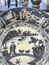 Three Japanese blue and white flower-shaped plates and a 'fisherman' dish, Edo, 17/18th C.