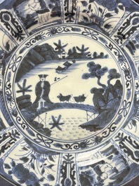 Three Japanese blue and white flower-shaped plates and a 'fisherman' dish, Edo, 17/18th C.