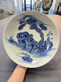 A Chinese blue, white and copper-red 'Three Friends of Winter' jar, and a blue and white 'Buddhist lion' dish, 18th C.