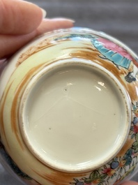 A pair of Chinese famille rose 'European subject' cups and saucers, Qianlong
