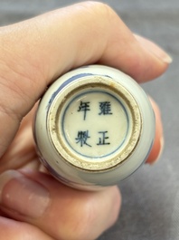 A Chinese peachbloom-crackle-glazed 'meiping' snuff bottle and a figural blue, white and copper-red snuff bottle, Yongzheng mark, 19th C.