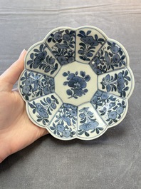Three Japanese blue and white flower-shaped plates and a 'fisherman' dish, Edo, 17/18th C.