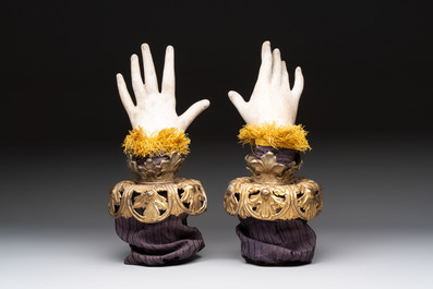 A pair of plaster hands with gilt-bronze cuffs and fabric adornments, Italy, 19th C.