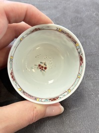 A set of six Chinese famille rose 'peacock' cups and saucers, Yongzheng