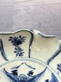 A Chinese blue and white ko-sometsuke flower-shaped tripod 'landscape' plate for the Japanese market, late Ming