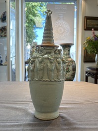 A Chinese qingbai-glazed covered urn applied with zodiac figures, Song