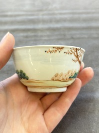 A pair of Chinese famille rose 'European subject' cups and saucers, Qianlong