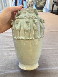 A Chinese qingbai-glazed covered urn applied with zodiac figures, Song