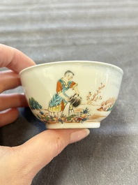 A pair of Chinese famille rose 'European subject' cups and saucers, Qianlong