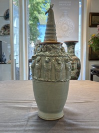 A Chinese qingbai-glazed covered urn applied with zodiac figures, Song