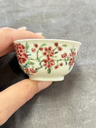 A set of six Chinese famille rose 'peacock' cups and saucers, Yongzheng