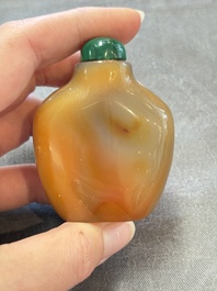A collection of nine Chinese agate snuff bottles, 20th C.