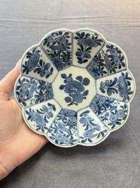 Three Japanese blue and white flower-shaped plates and a 'fisherman' dish, Edo, 17/18th C.
