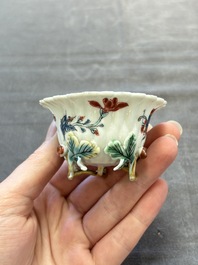 Two Chinese gilt-decorated famille rose cups and saucers with floral design, Qianlong