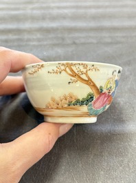 A pair of Chinese famille rose 'European subject' cups and saucers, Qianlong