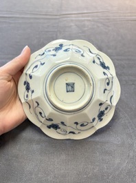 Three Japanese blue and white flower-shaped plates and a 'fisherman' dish, Edo, 17/18th C.