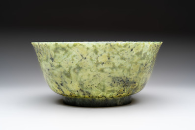 A large Chinese mottled-green serpentine bowl, 20th C.