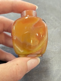A collection of nine Chinese agate snuff bottles, 20th C.