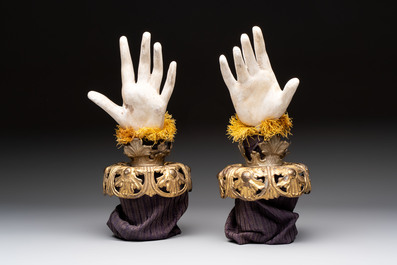 A pair of plaster hands with gilt-bronze cuffs and fabric adornments, Italy, 19th C.