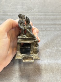 Five Chinese bronze seals and an Indonesian bronze figure group, 18/19th C.