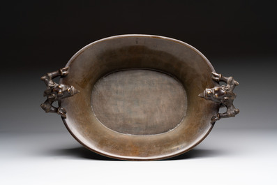 A large Chinese bronze basin with chilong handles, Qianlong mark, 20th C.