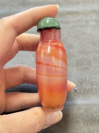 A collection of nine Chinese agate snuff bottles, 20th C.