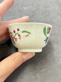A set of six Chinese famille rose 'peacock' cups and saucers, Yongzheng