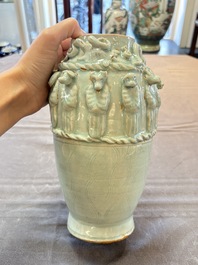 A Chinese qingbai-glazed covered urn applied with zodiac figures, Song
