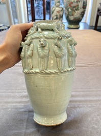 A Chinese qingbai-glazed covered urn applied with zodiac figures, Song