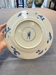 Four Chinese blue and white plates with floral design, Kangxi