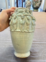 A Chinese qingbai-glazed covered urn applied with zodiac figures, Song