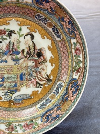 A fine famille rose 'ladies and boys' plate, Samson, Paris, 19th C.